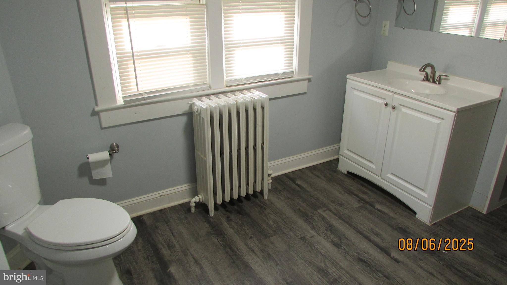 4724 Branchville Road College Park, MD 20740 - Photo 25 of 41 a bathroom with a sink and a toilet