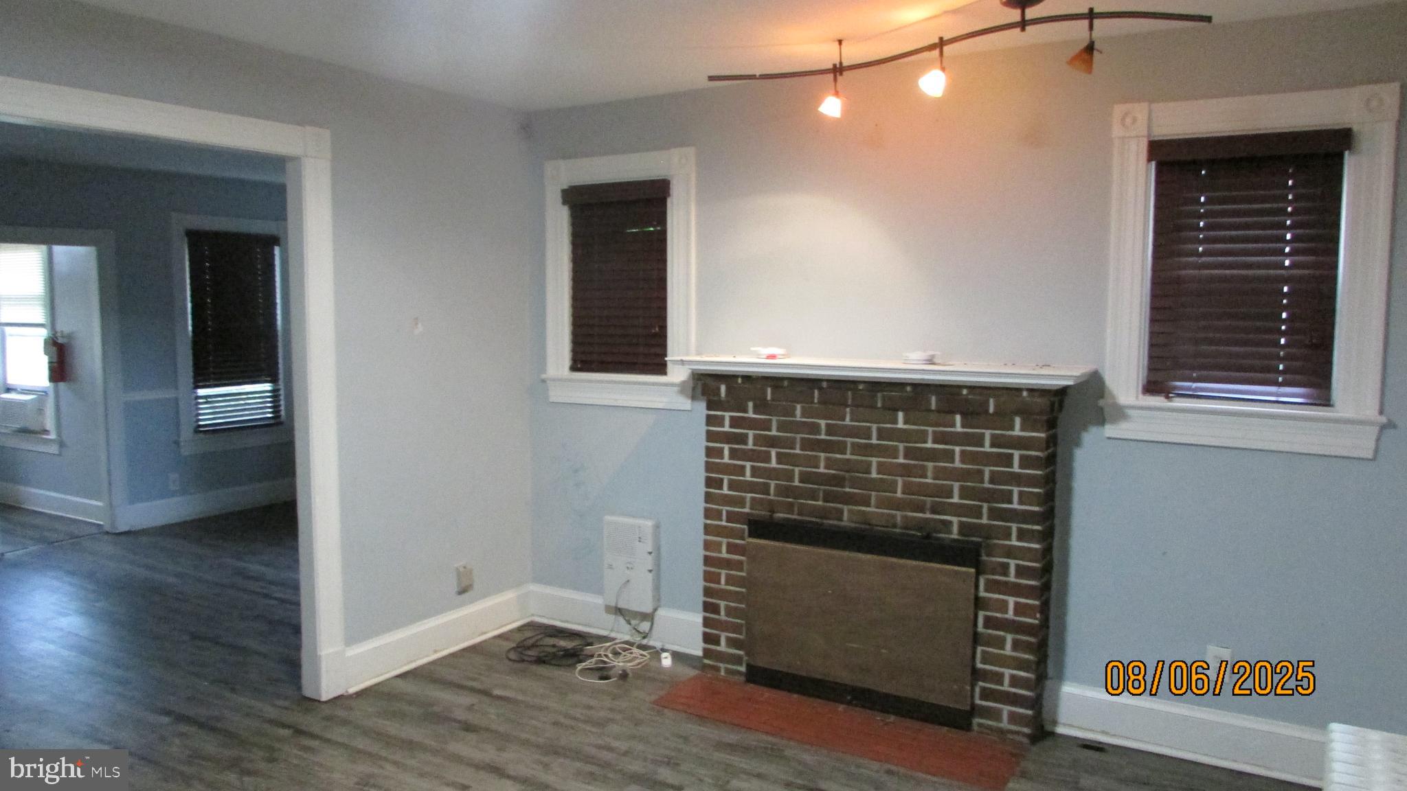 4724 Branchville Road College Park, MD 20740 - Photo 9 of 41 a view of an empty room and wooden floor