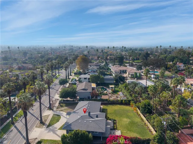 an aerial view of a house having swimming pool