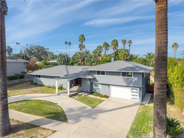 a view of a house with a swimming pool