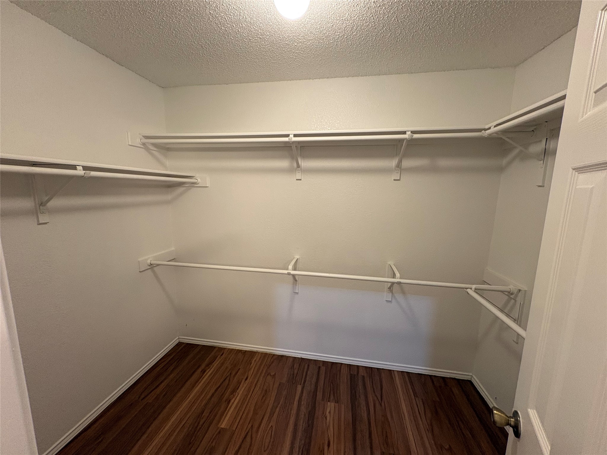 8002 Marble Ridge Drive Austin, TX 78747 - Photo 14 of 20 Primary bedroom walk in closet