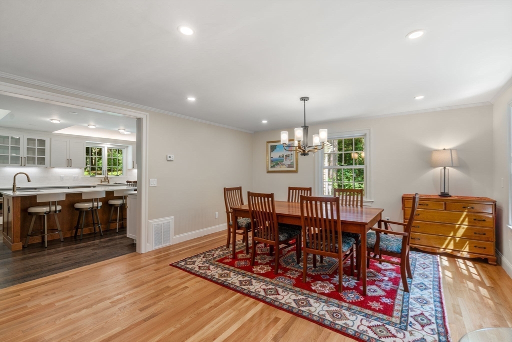 156 Cherry Brook Road Weston, MA 02493 - Photo 15 of 38 a view of a dining room with furniture and chandelier