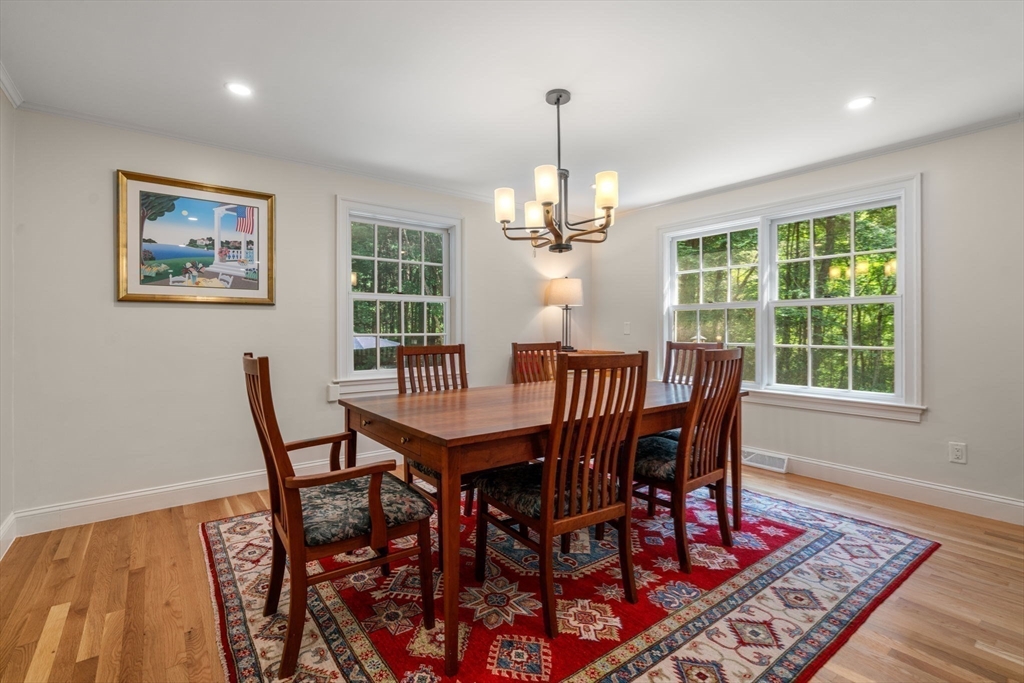 156 Cherry Brook Road Weston, MA 02493 - Photo 16 of 38 a view of a dining room with furniture window and wooden floor