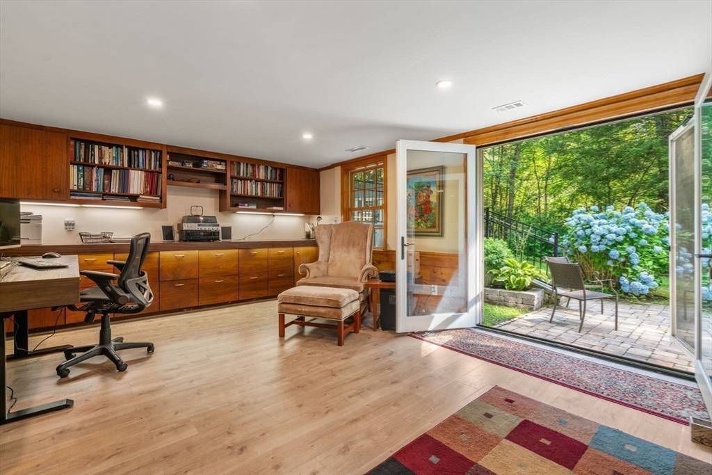 156 Cherry Brook Road Weston, MA 02493 - Photo 33 of 38 a work room with furniture and a floor to ceiling window