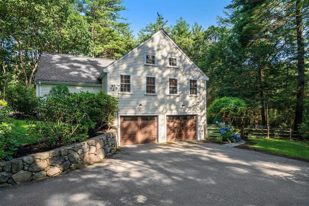 156 Cherry Brook Road Weston, MA 02493 - Photo 37 of 38 a front view of a house with a yard