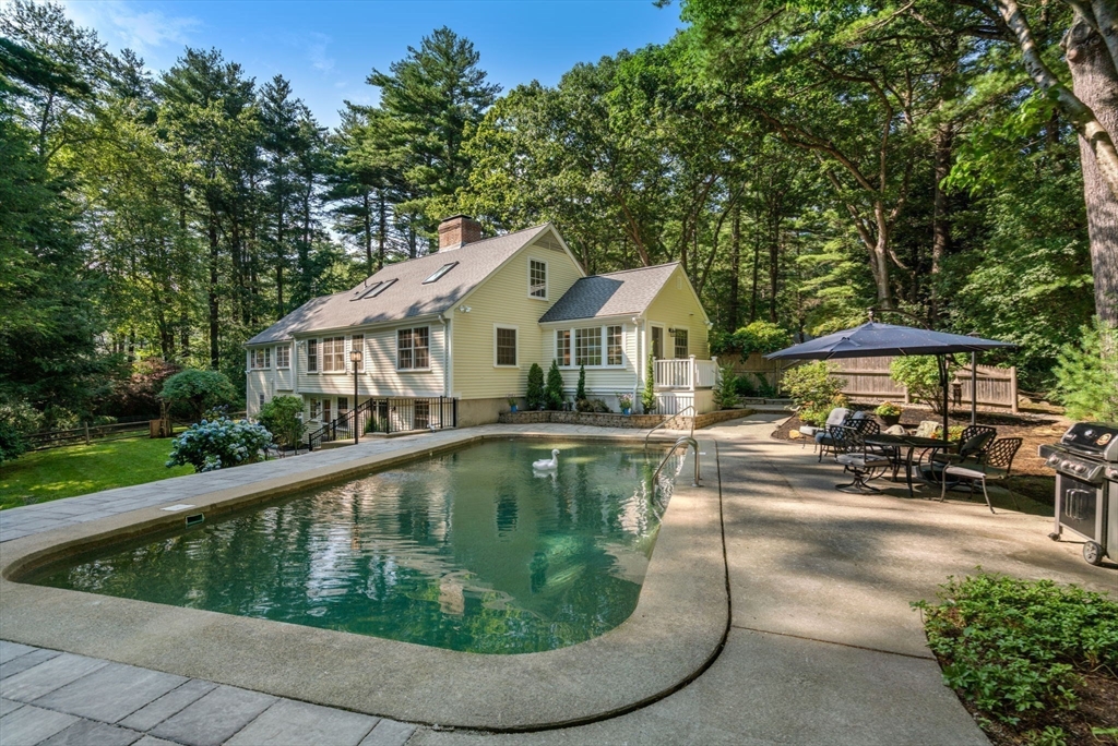 156 Cherry Brook Road Weston, MA 02493 - Photo 4 of 38 a view of a house with swimming pool and sitting area