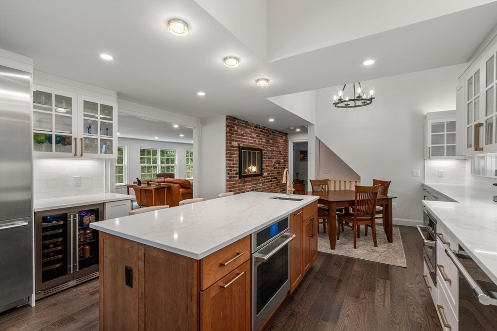 156 Cherry Brook Road Weston, MA 02493 - Photo 7 of 38 a kitchen with stainless steel appliances granite countertop a stove and a refrigerator