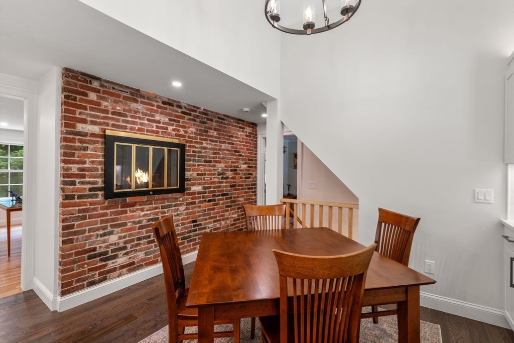 156 Cherry Brook Road Weston, MA 02493 - Photo 10 of 38 a view of a dining room with furniture and wooden floor