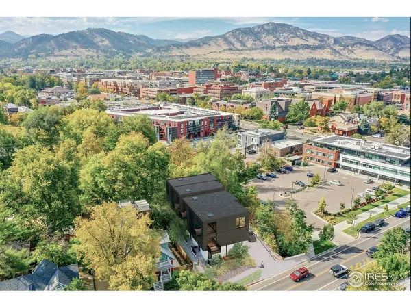 a view of a city with mountain