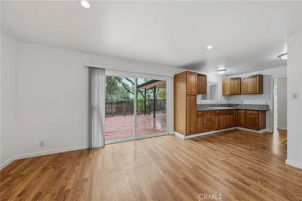 a view of kitchen with wooden floor