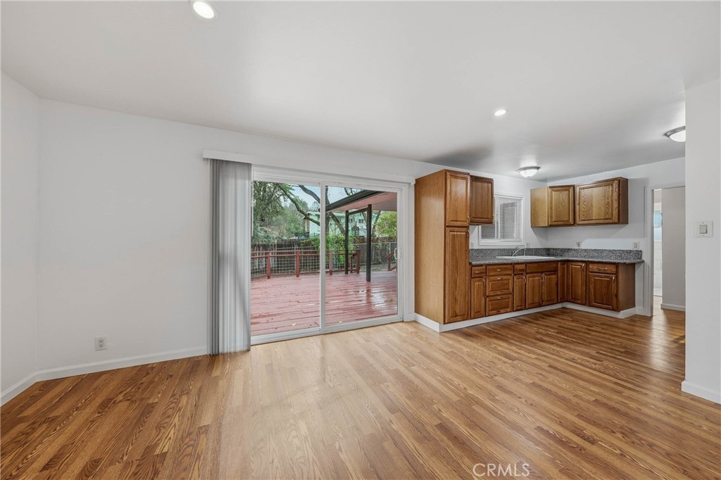 6150 Ridgeview Drive Clearlake, CA 95422 - Photo 13 of 38 a view of kitchen with wooden floor