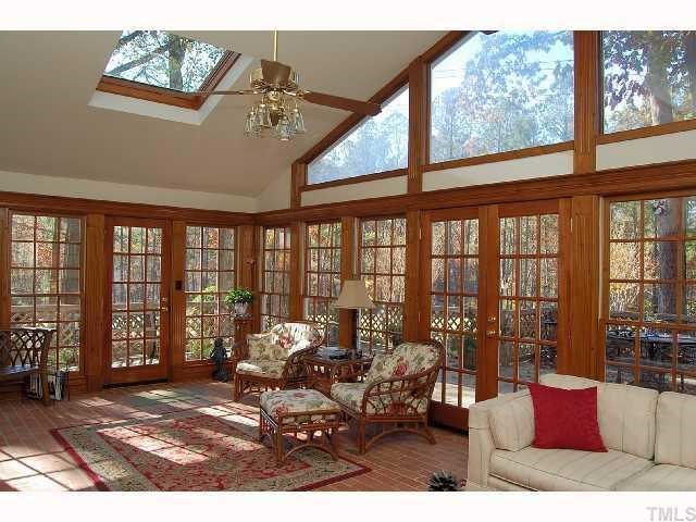 8713 Hidden View Court Raleigh, NC 27613 - Photo 5 of 12 a living room with furniture and floor to ceiling windows