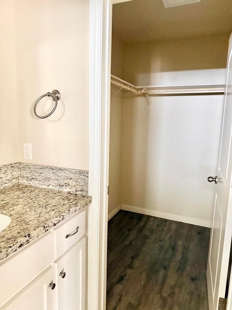 1310 North Belmont Road Exeter, CA 93221 - Photo 12 of 15 a view of a room with wooden floor and glass door