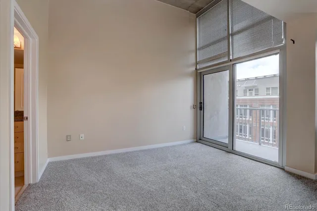 a view of empty room with windows