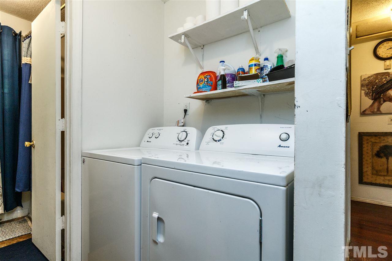 2009 Atkins Drive Raleigh, NC 27610 - Photo 11 of 18 a utility room with dryer and washer