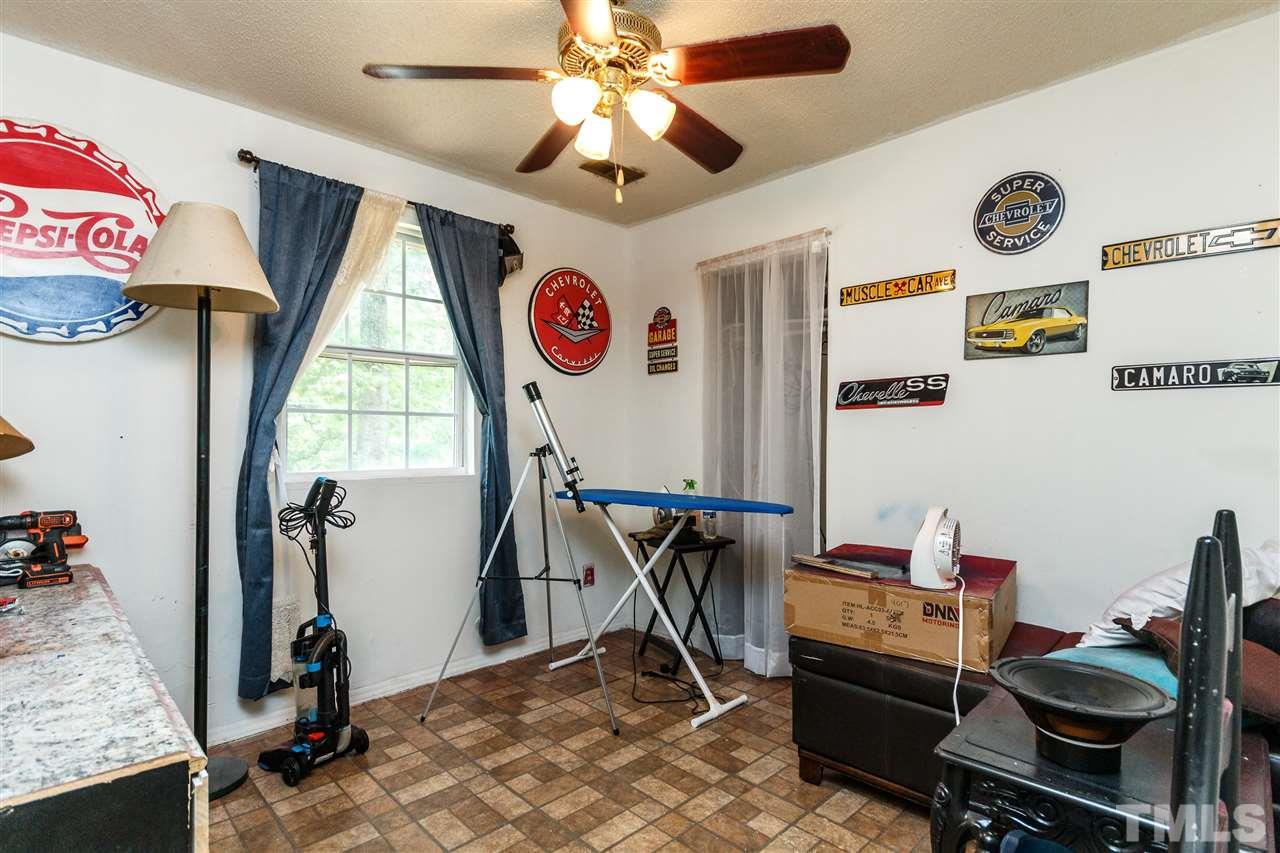 2009 Atkins Drive Raleigh, NC 27610 - Photo 15 of 18 a view of a room with gym equipment