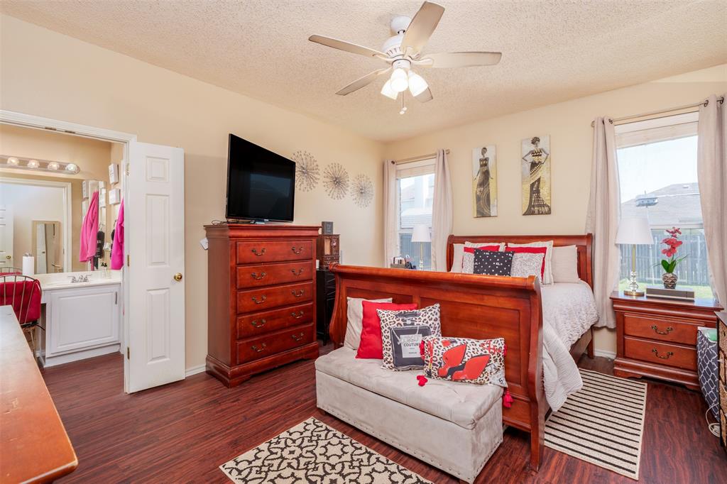 192 Hirth Drive Crowley, TX 76036 - Photo 14 of 22 a living room with furniture and a flat screen tv