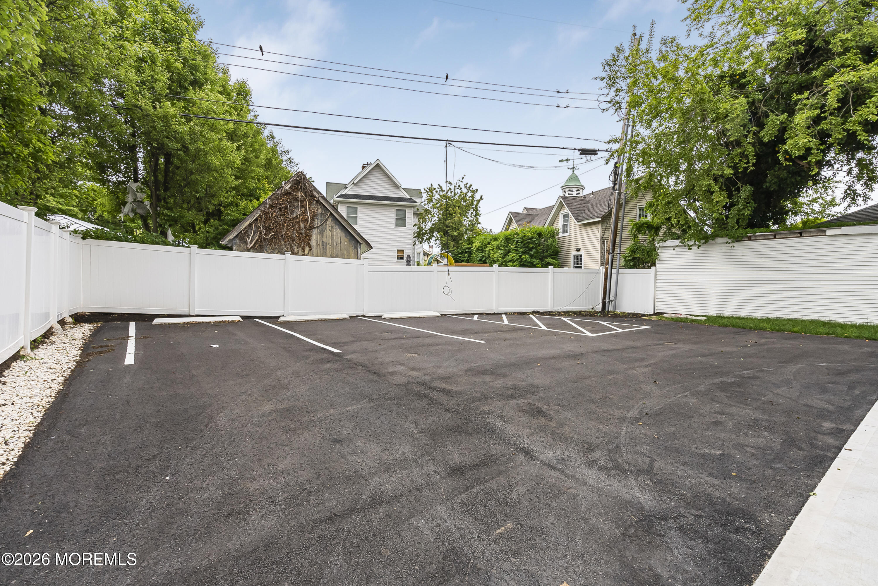 205 Edgemont Drive, Unit 2 Allenhurst, NJ 07711 - Photo 24 of 25 Back Parking Lot