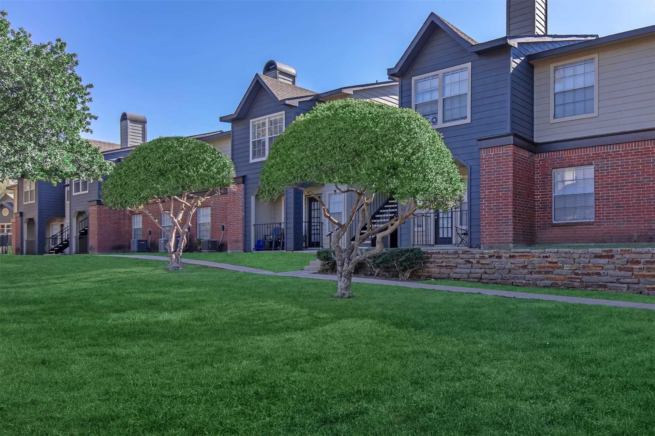 8301 Boat Club Road, Unit 827 Fort Worth, TX 76179 - Photo 33 of 42 a house view with a garden space