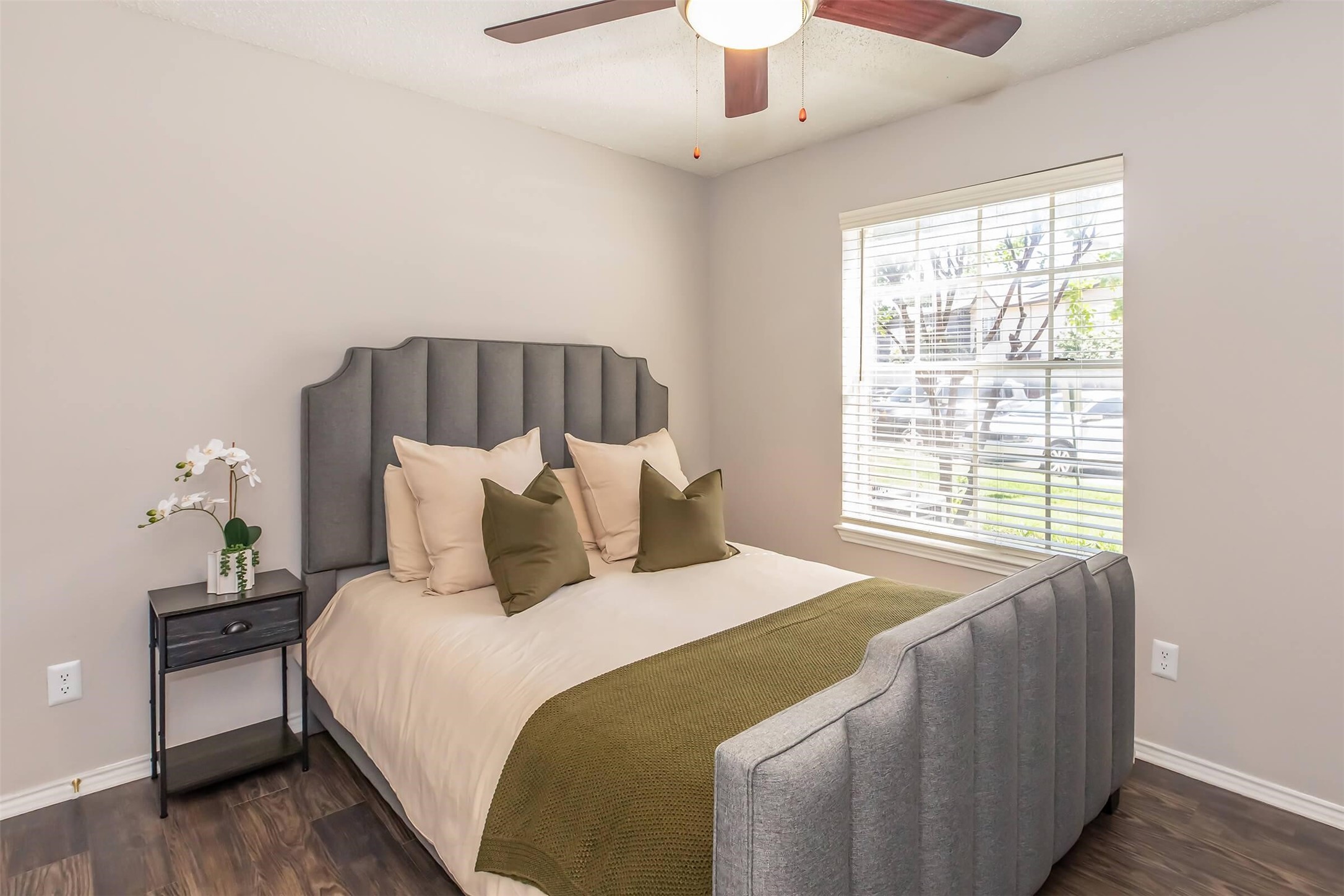 8301 Boat Club Road, Unit 827 Fort Worth, TX 76179 - Photo 5 of 42 a bedroom with a large bed and a chandelier