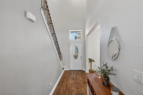 a kitchen with a sink stove and refrigerator