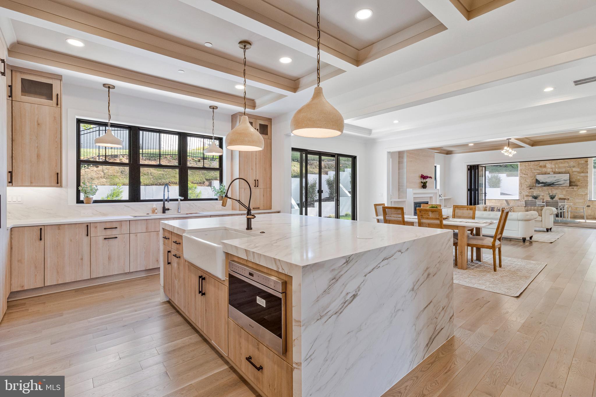 7709 Sebago Road Bethesda, MD 20817 - Photo 11 of 65 a large white kitchen with lots of counter top space