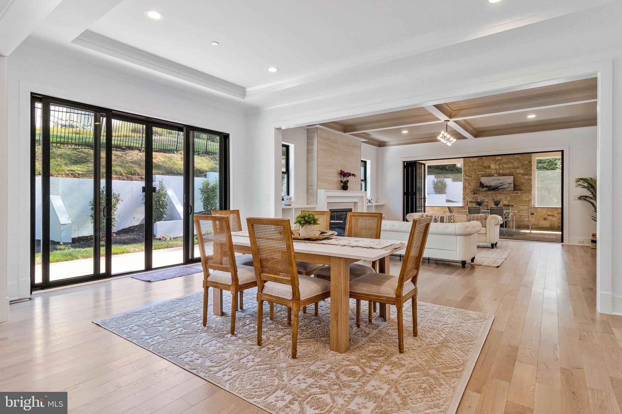 7709 Sebago Road Bethesda, MD 20817 - Photo 14 of 65 a dining room with furniture window and wooden floor