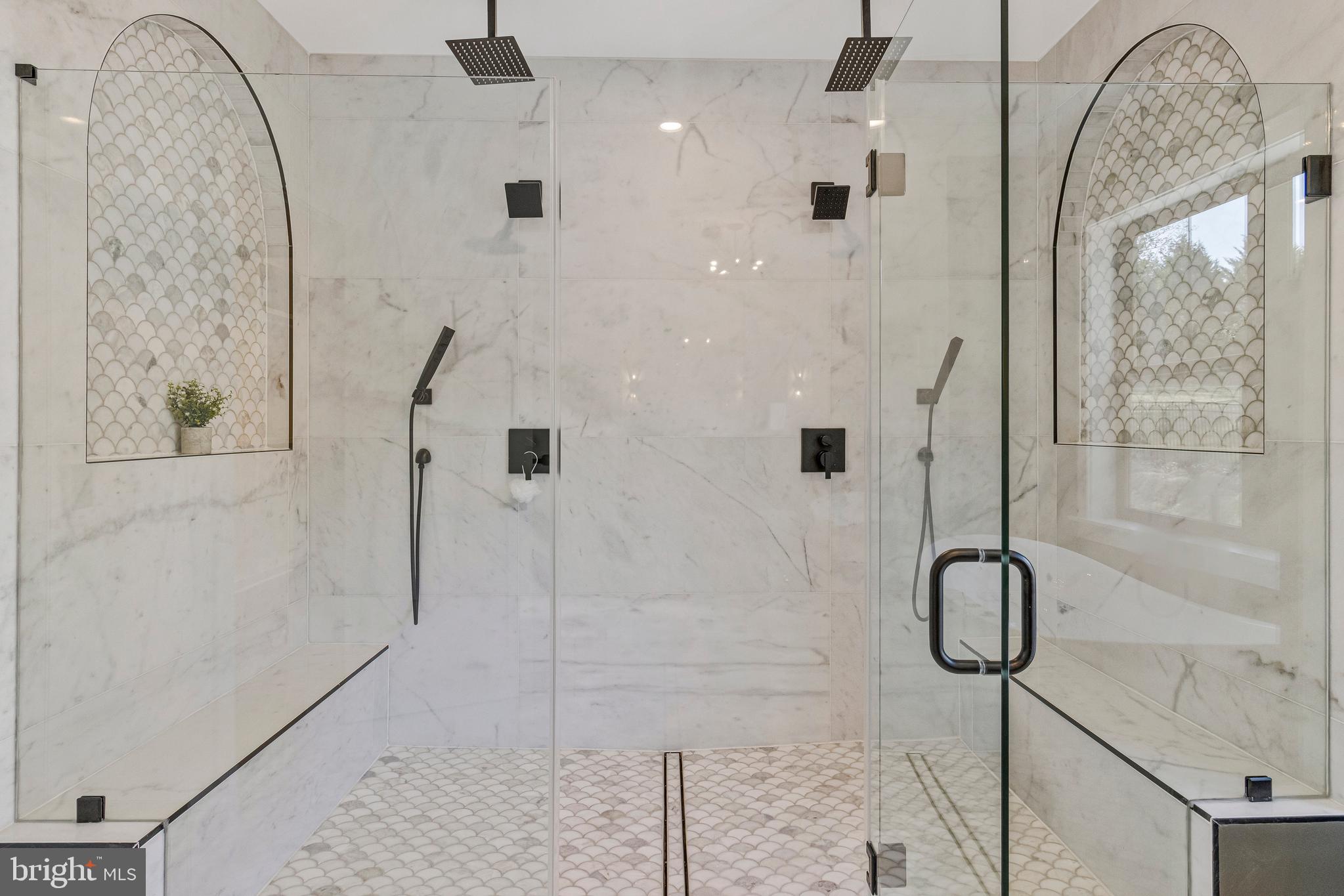 7709 Sebago Road Bethesda, MD 20817 - Photo 29 of 40 a bathroom with a shower