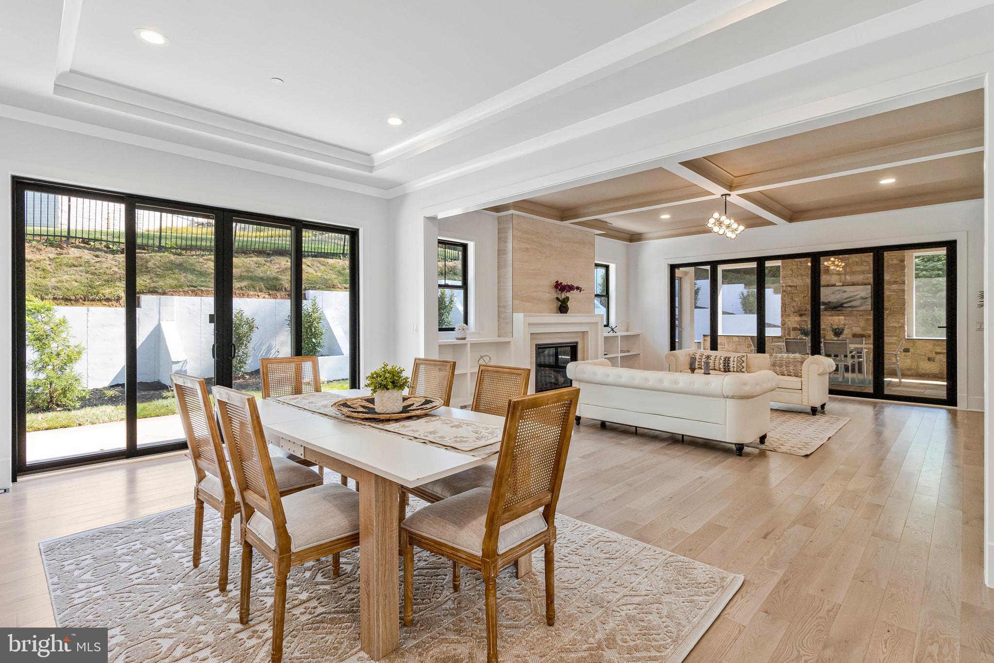 7709 Sebago Road Bethesda, MD 20817 - Photo 31 of 65 a living room with furniture and a large window