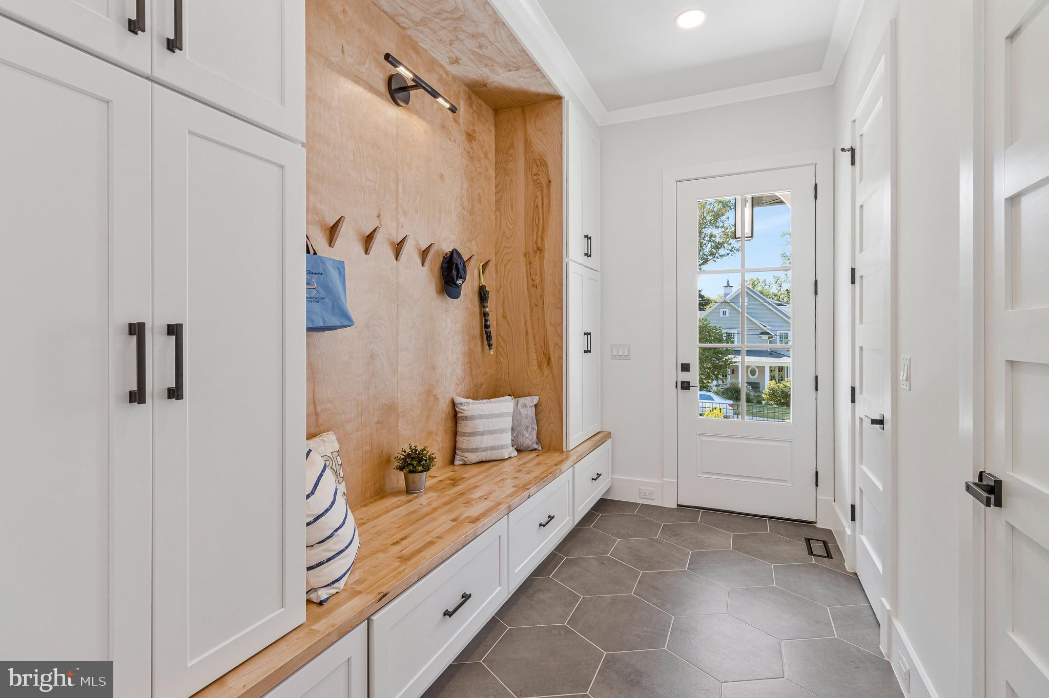 7709 Sebago Road Bethesda, MD 20817 - Photo 33 of 65 a bathroom with a tub and shower