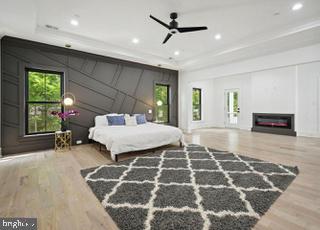 7709 Sebago Road Bethesda, MD 20817 - Photo 40 of 68 a bedroom with a bed and a window