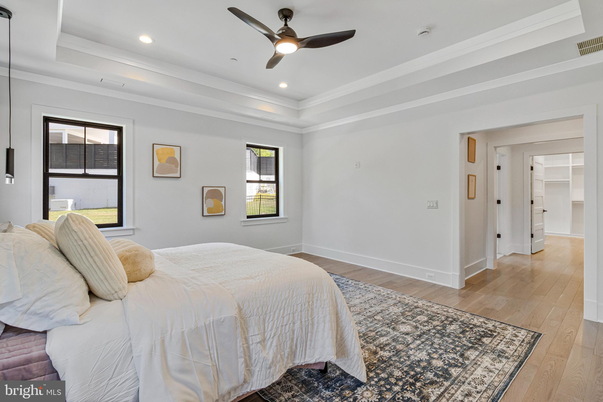 7709 Sebago Road Bethesda, MD 20817 - Photo 40 of 65 a bedroom with a bed and a window