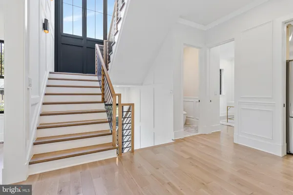 a view of entryway with wooden floor