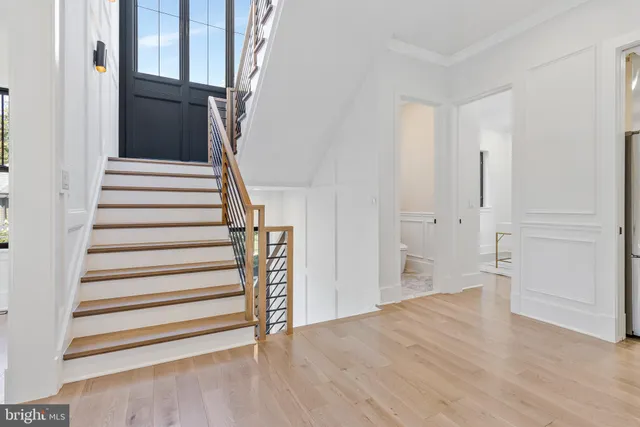 a view of entryway with wooden floor