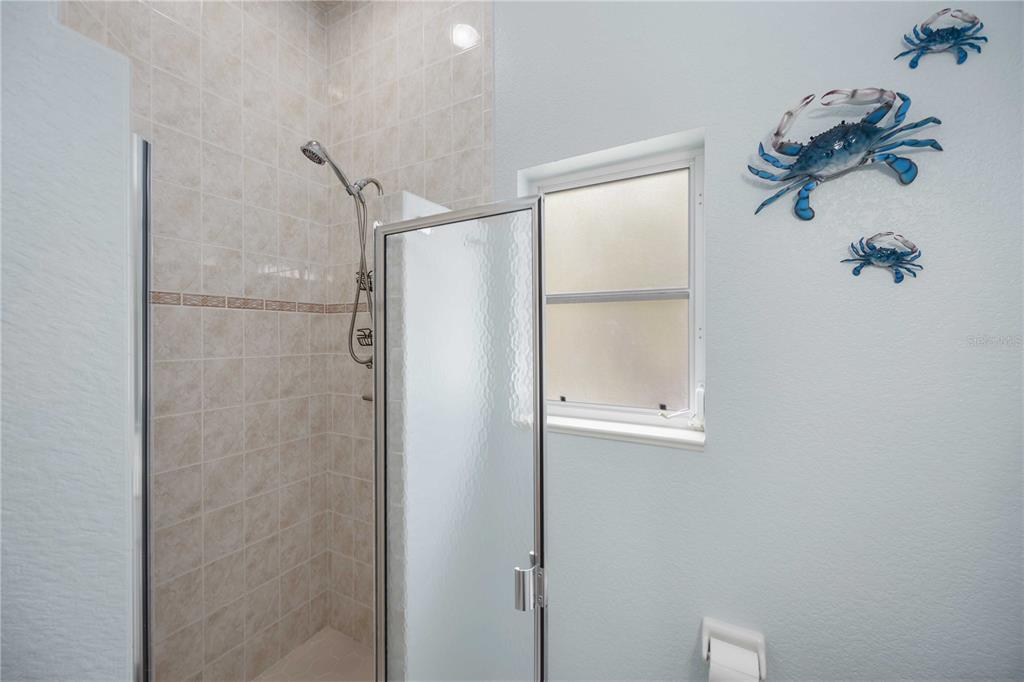 48 Bunker Road Rotonda West, FL 33947 - Photo 41 of 59 a bathroom with a shower