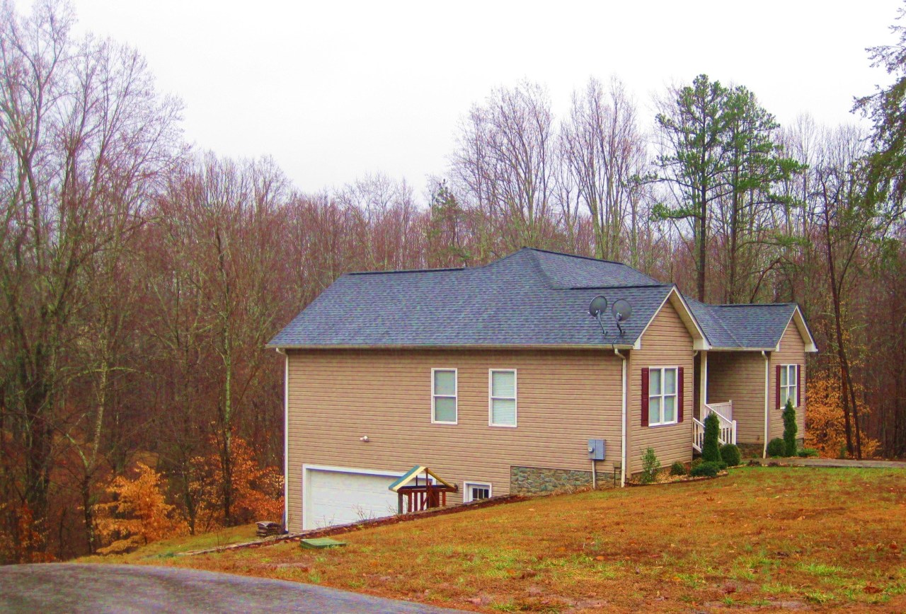 112 Little Creek Road Moneta, VA 24121 - Photo 11 of 90 Garage Under / 2 with Woods AllAround!