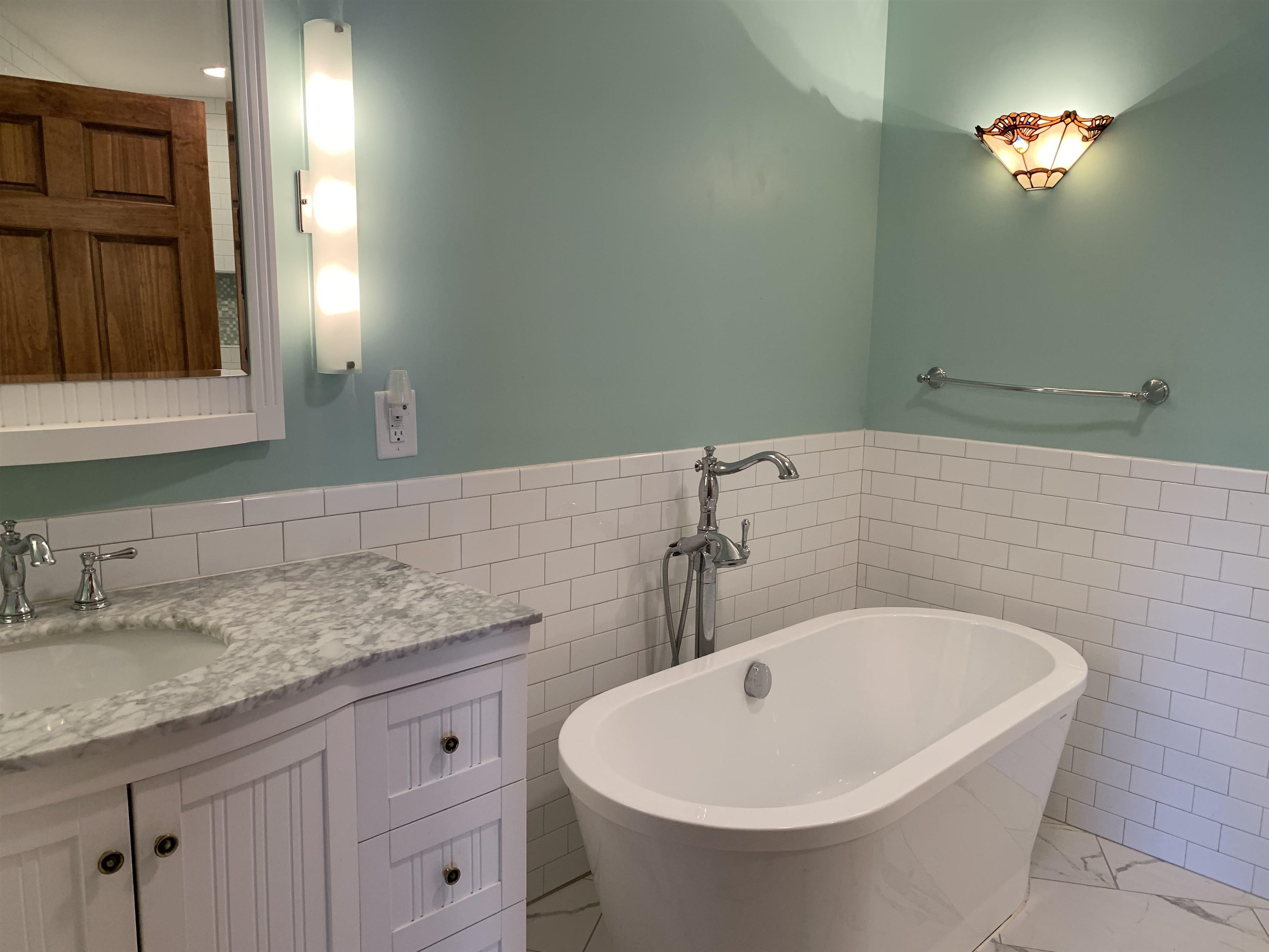 11280 Pleasant Ridge Road Arlington, TN 38002 - Photo 13 of 34 a bathroom with a sink and a mirror
