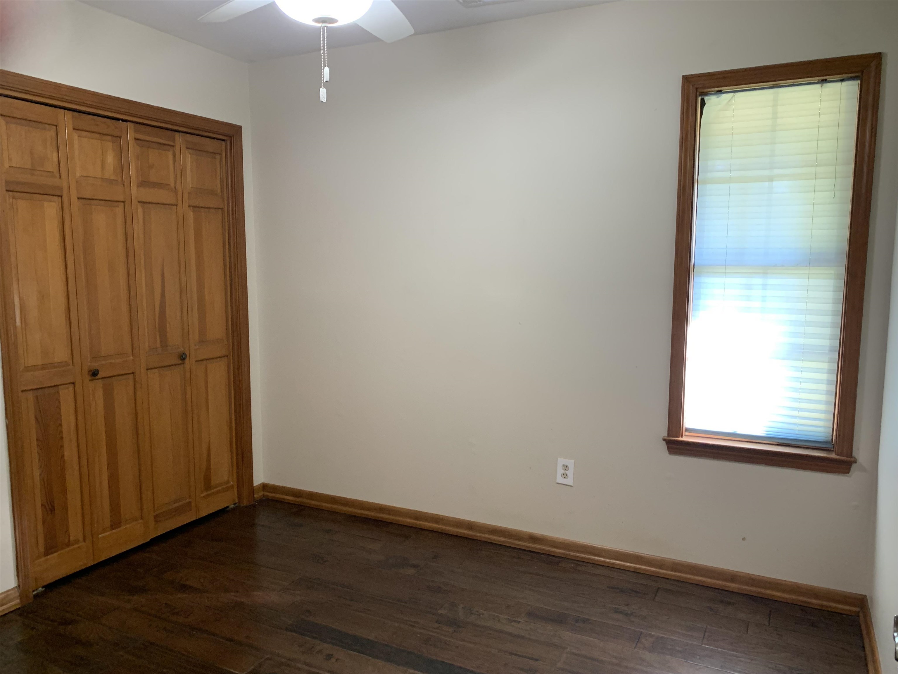 11280 Pleasant Ridge Road Arlington, TN 38002 - Photo 15 of 34 an empty room with wooden floor and windows