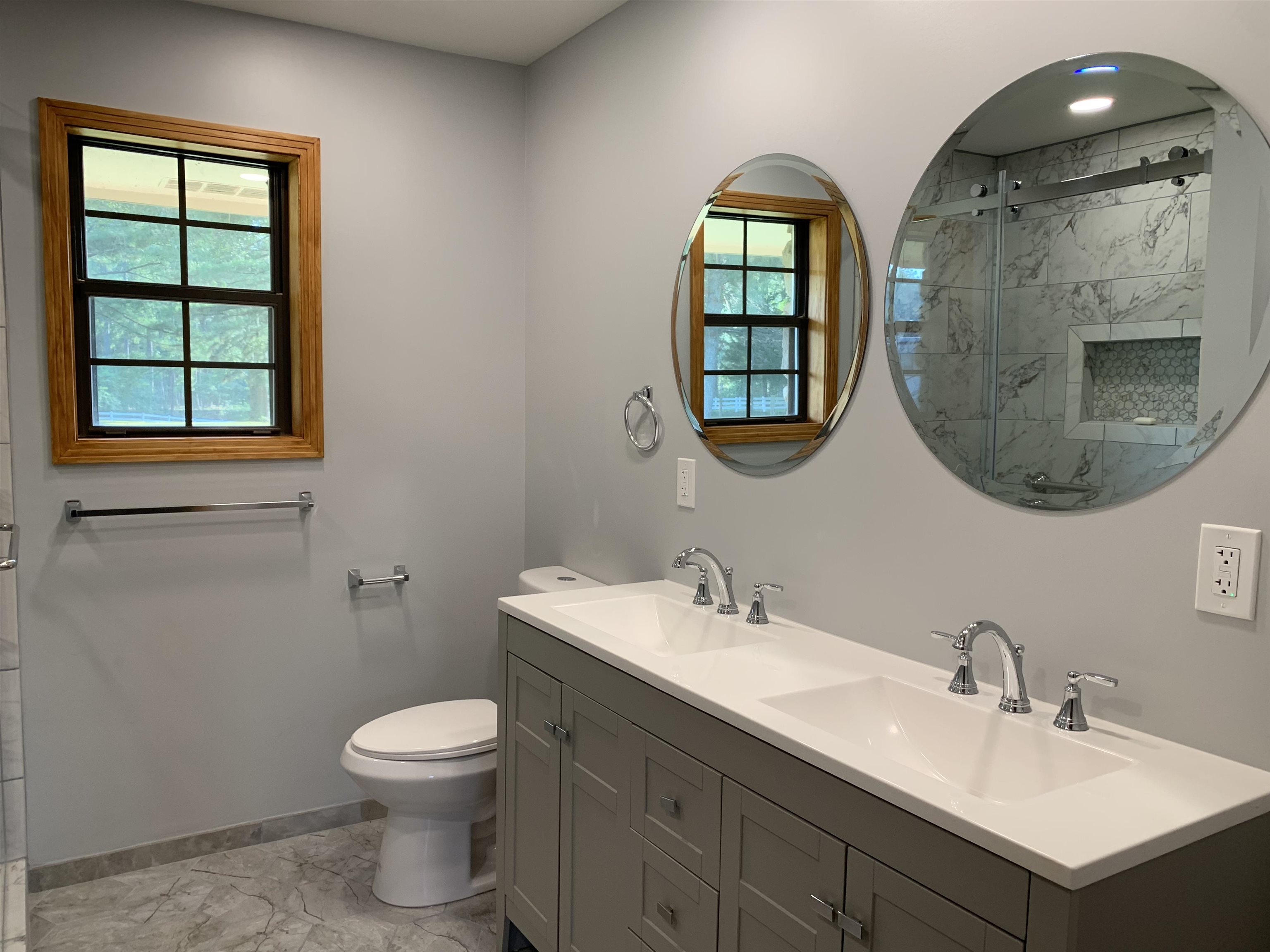 11280 Pleasant Ridge Road Arlington, TN 38002 - Photo 16 of 34 a bathroom with a toilet sink and mirror