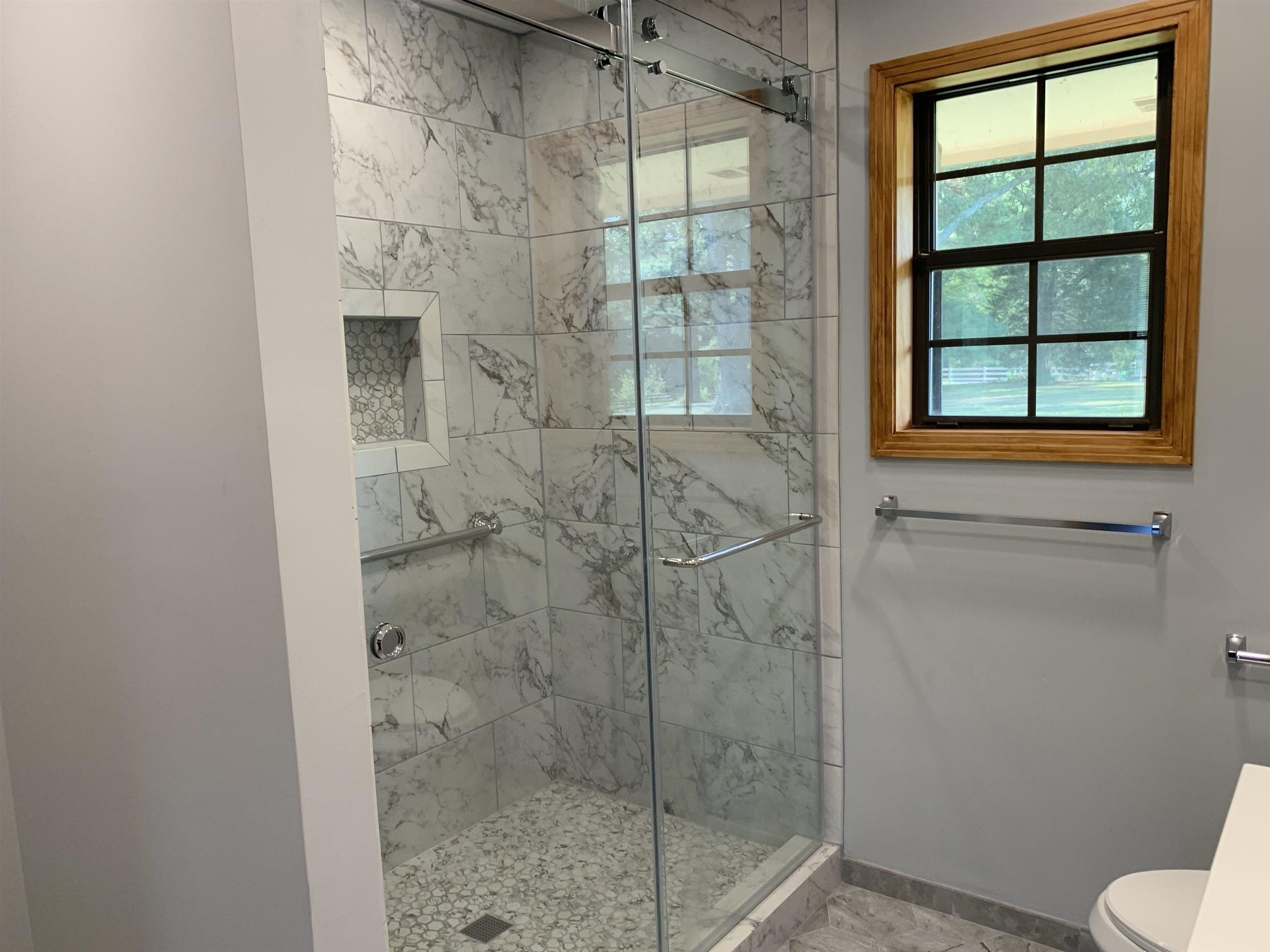 11280 Pleasant Ridge Road Arlington, TN 38002 - Photo 17 of 34 a bathroom with a shower and toilet