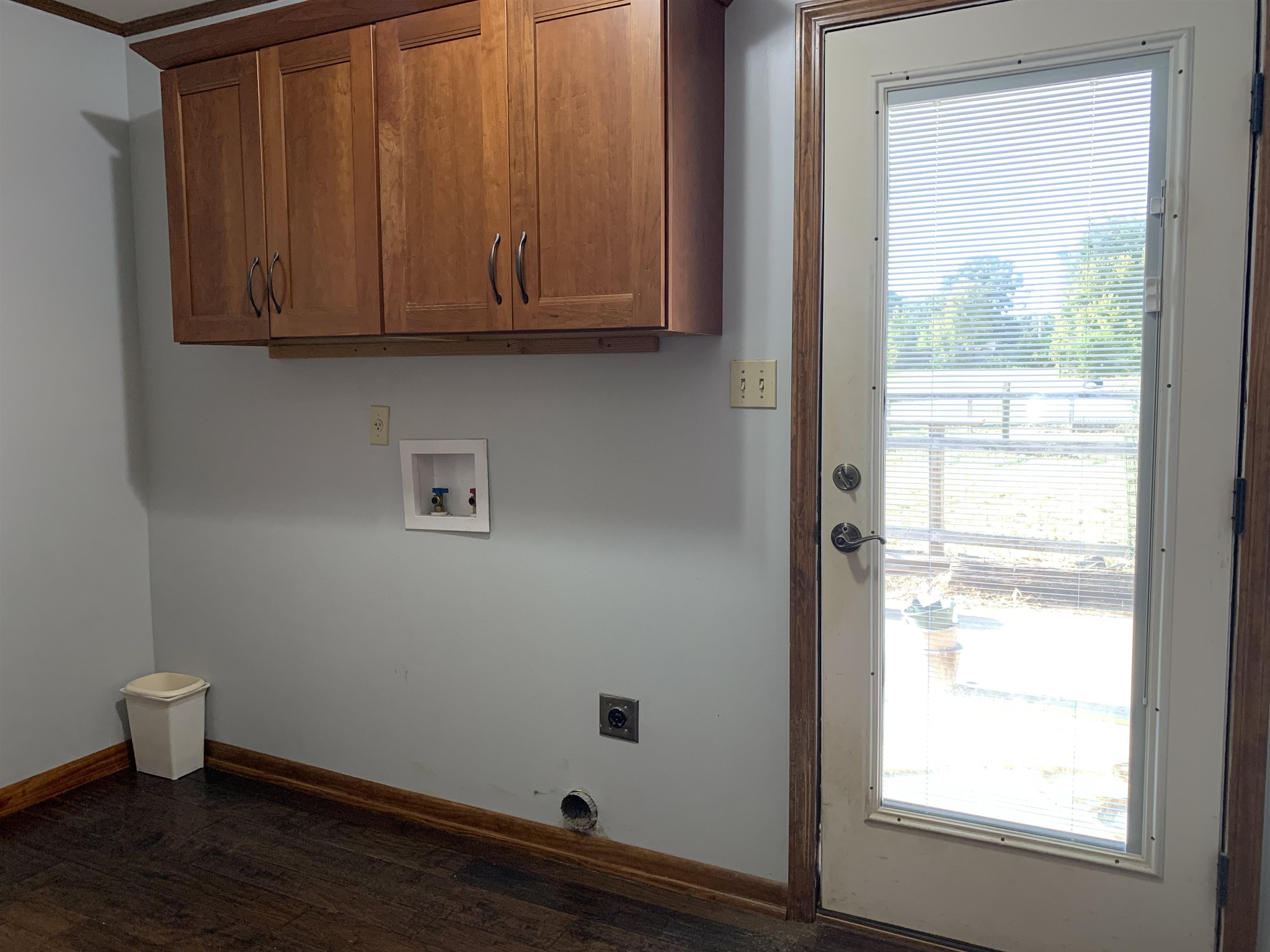 11280 Pleasant Ridge Road Arlington, TN 38002 - Photo 19 of 34 a view of an empty room with a window and wooden floor