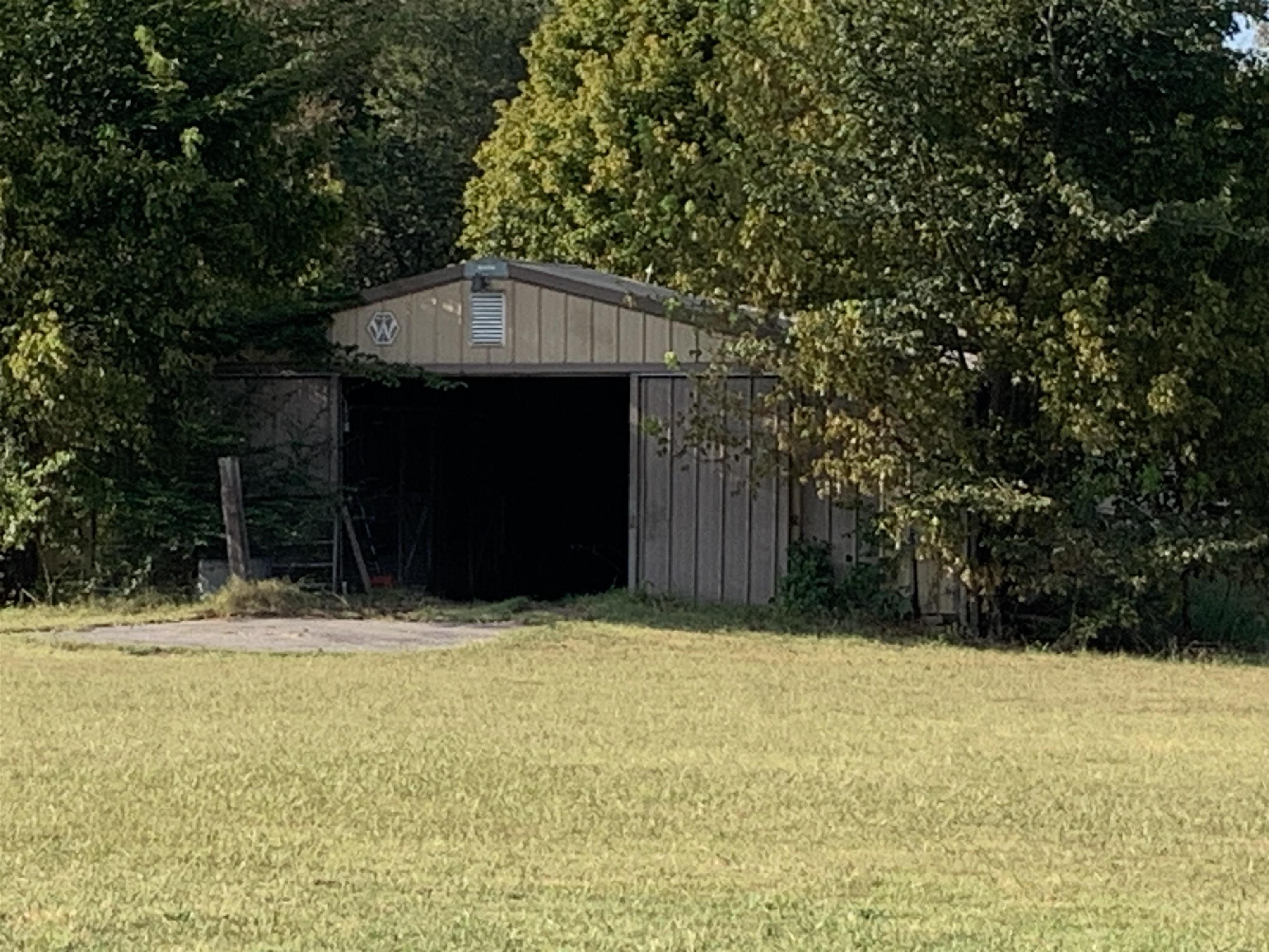 11280 Pleasant Ridge Road Arlington, TN 38002 - Photo 30 of 34 a front view of a house with a yard