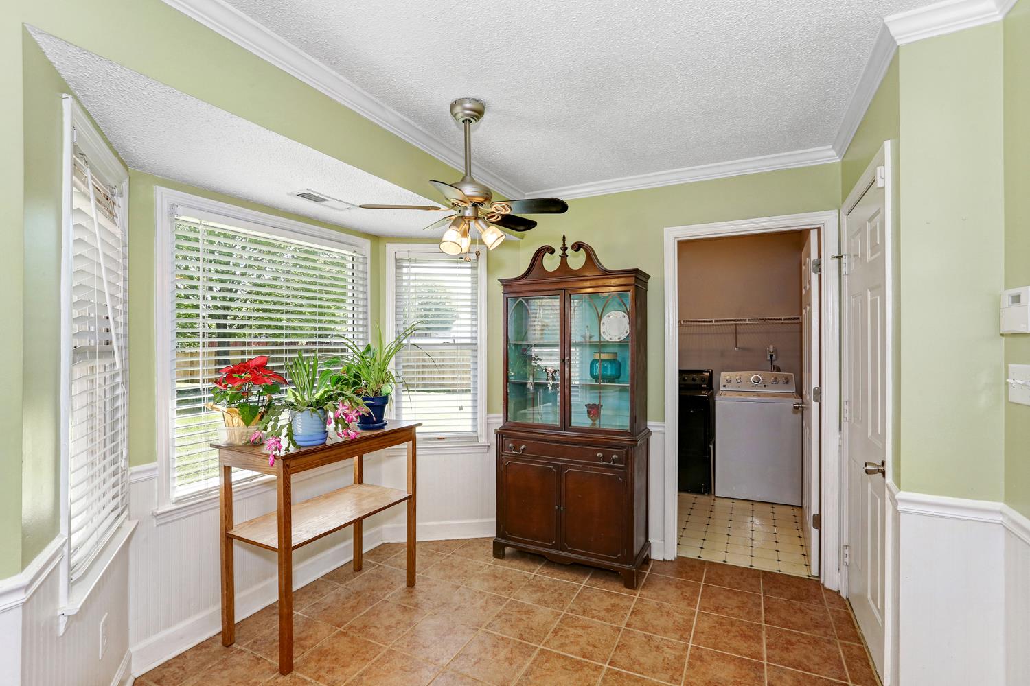 126 Raspberry Way Madison, AL 35757 - Photo 11 of 25 Breakfast Area - With chair rail and wainscoting. Door leads to the laundry room.