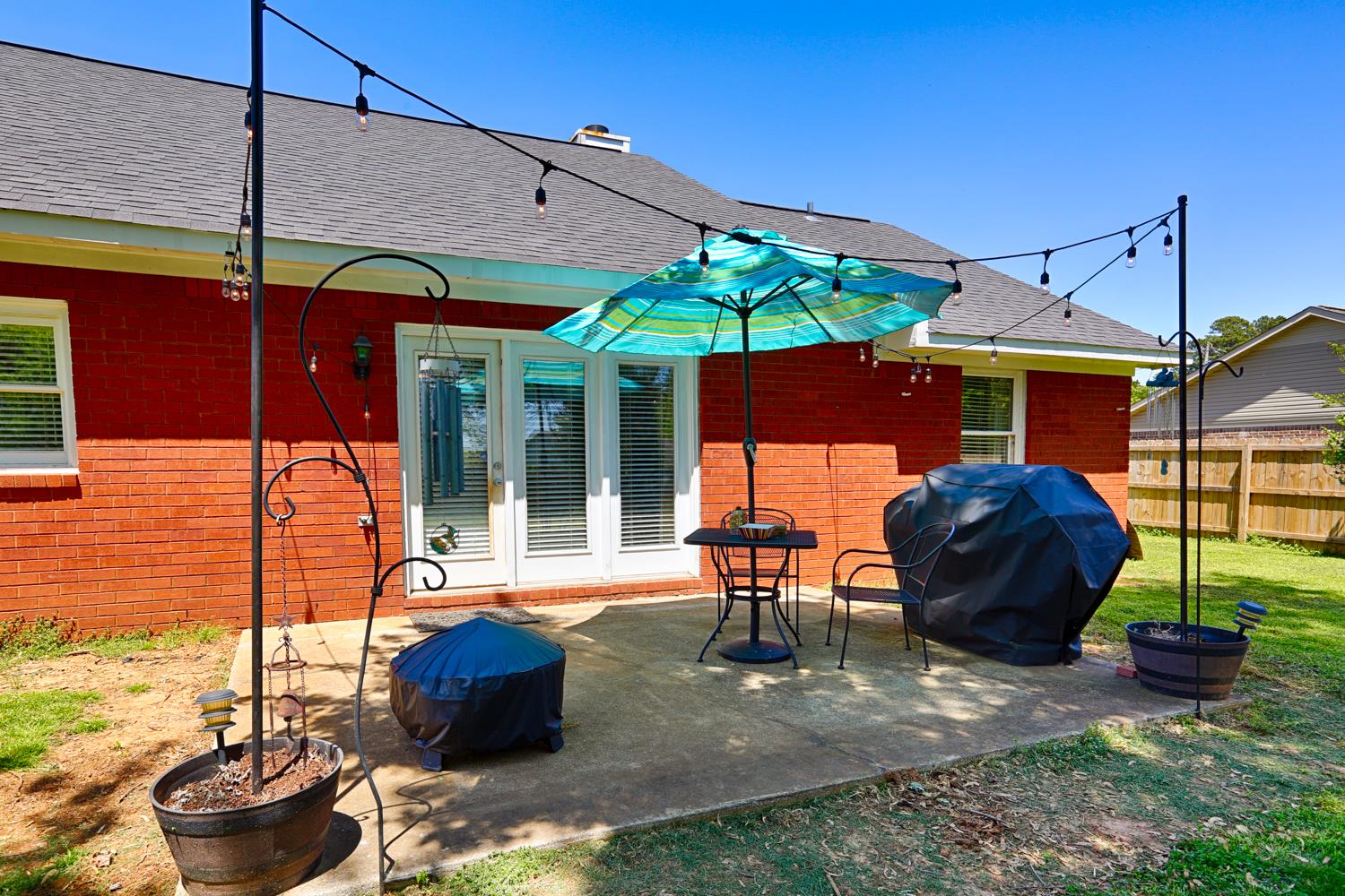 126 Raspberry Way Madison, AL 35757 - Photo 22 of 25 Back Patio - Great space for entertaining with easy access to the dining and kitchen areas.