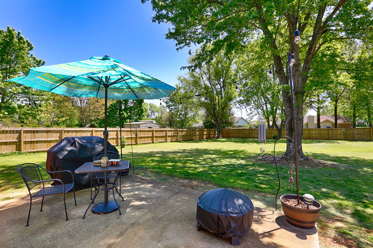 126 Raspberry Way Madison, AL 35757 - Photo 23 of 25 Reverse View of Patio - Showing the huge yard with new 6' plank privacy fencing.