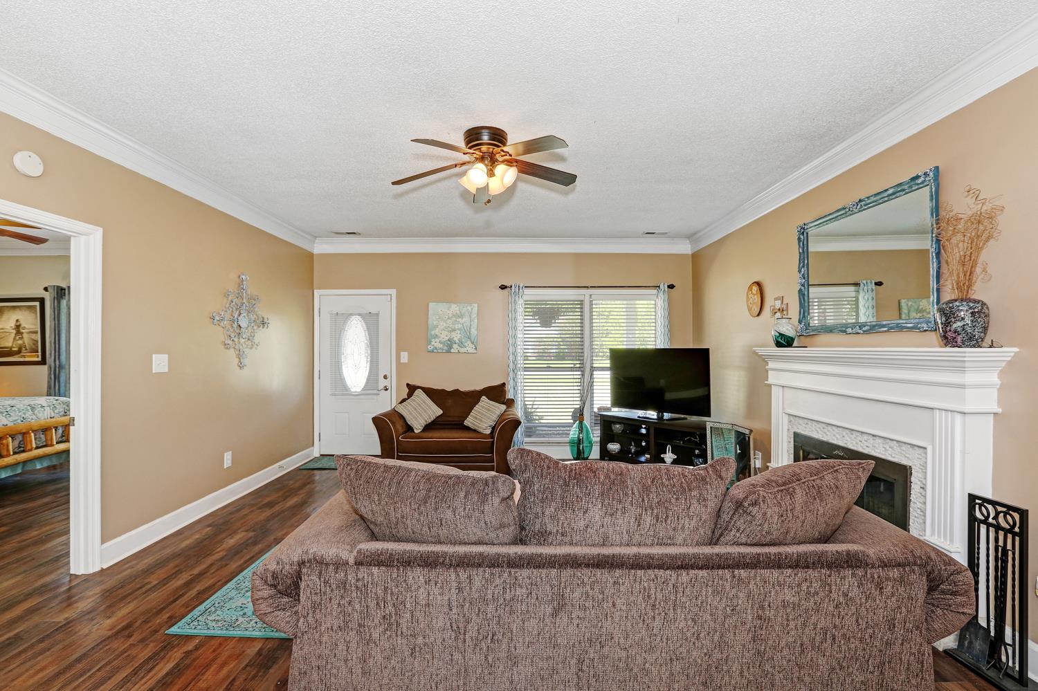 126 Raspberry Way Madison, AL 35757 - Photo 6 of 25 Reverse View of Living Room - The cased opening to the left leads to the master suite.