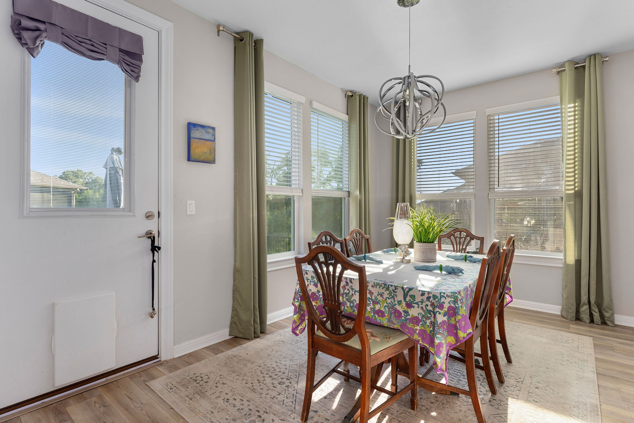 101 Bristol Cove Georgetown, TX 78633 - Photo 15 of 29 Dining room with light wood-style flooring and a chandelier