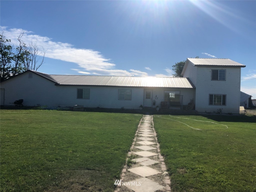 4814 Rd W Southeast Warden, WA 98857 - Photo 1 of 1 a front view of a house with a yard