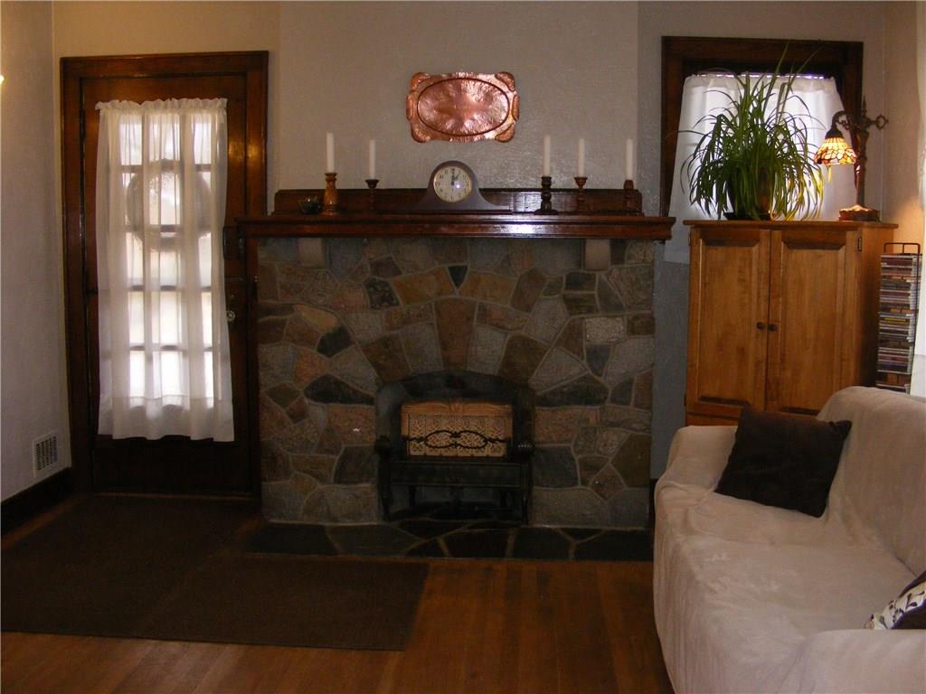 300 West Ingomar Road Pittsburgh, PA 15237 - Photo 2 of 21 Gorgeous stone gas fireplace in the living room! Original woodwork mantle is in fantastic condition!