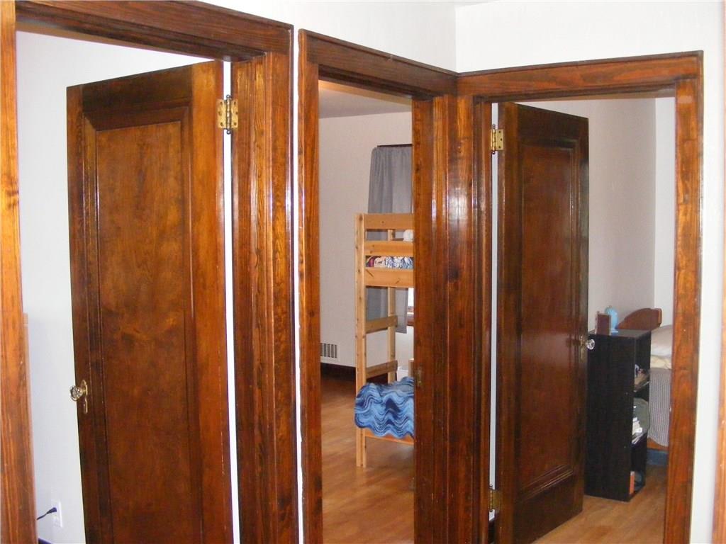 300 West Ingomar Road Pittsburgh, PA 15237 - Photo 8 of 21 second floor landing where the bedrooms and bathroom are steps apart. Original wood doors!